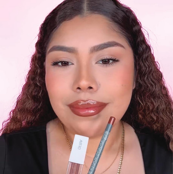 Using applicator, line lips and use single strokes to fill in lips completely.