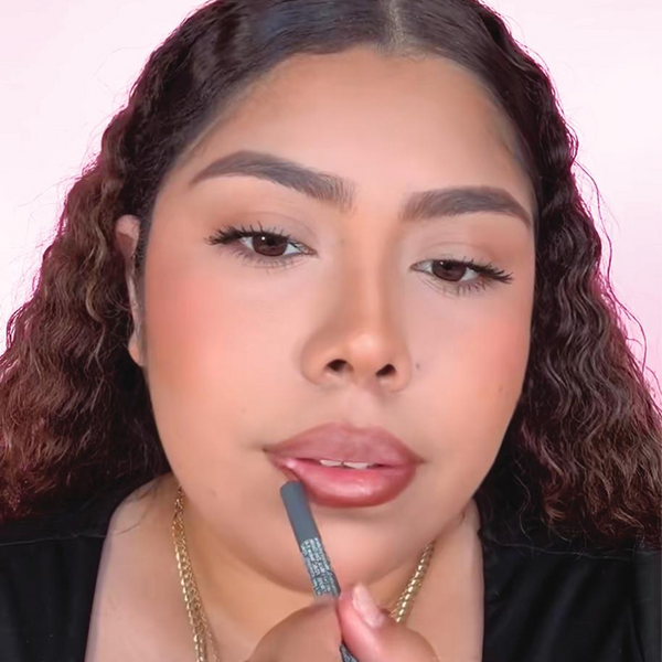 Using short strokes, apply the pencil following the natural lip line.